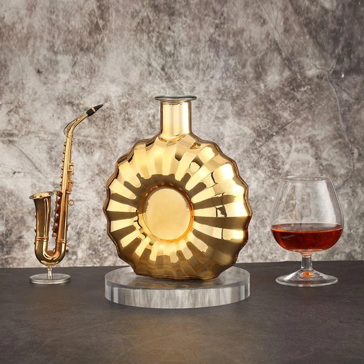 Brandy guldpläterad Xo glasflaska